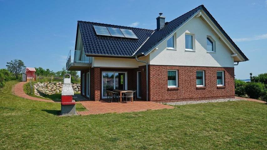 Ferienhaus für 8 Personen, mit Sauna und Seeblick sowie Garten, mit Haustier in Wohlenberg