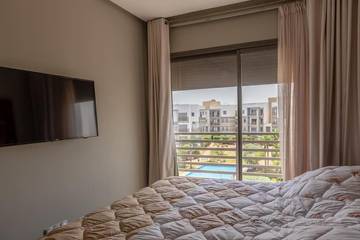 Gîte pour 6 personnes, avec terrasse ainsi que jardin et piscine à Bouskoura