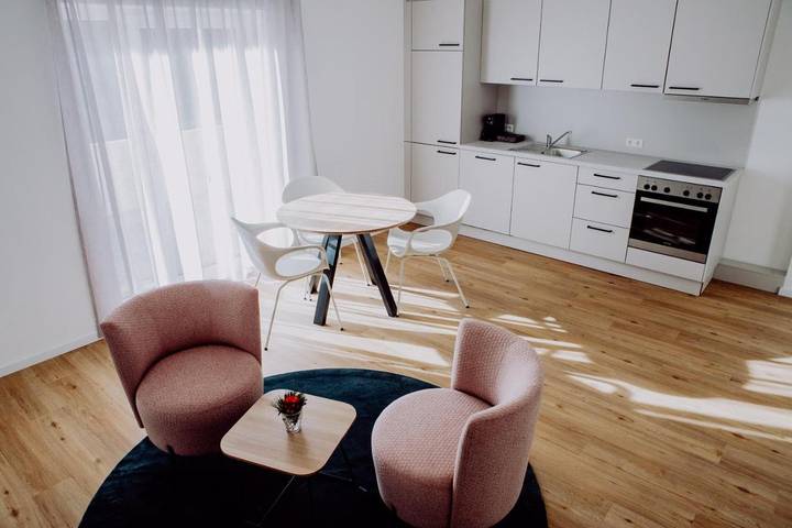 Apartmenthotel für 4 Personen, mit Balkon und Terrasse sowie Garten und Ausblick