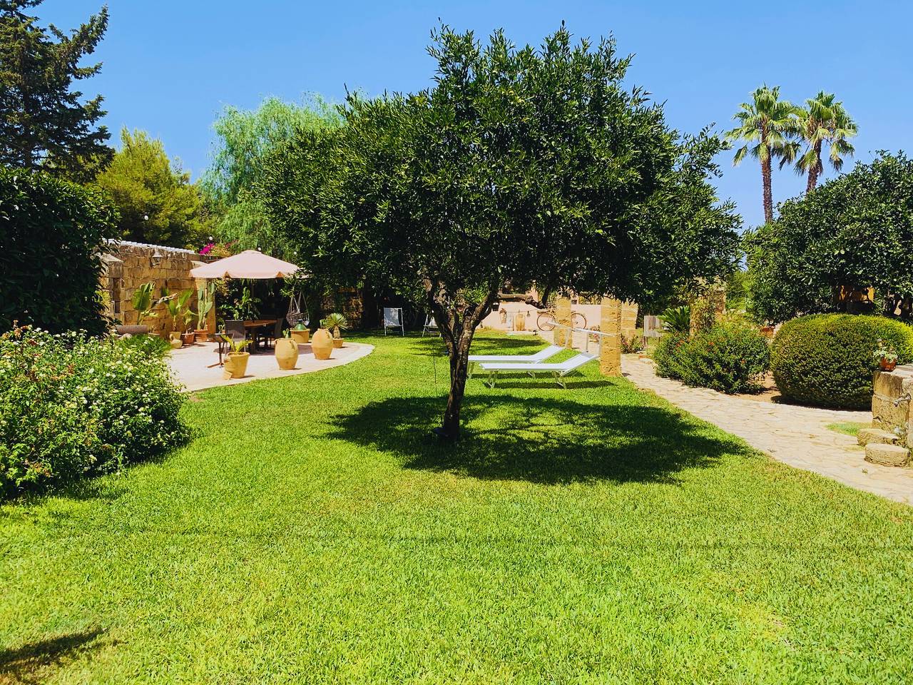 Maison de vacances 'Appartement Vue Jardin' avec terrasse privée et climatisation in Golfe de Tarente