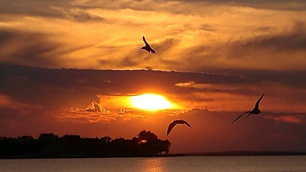 Waterfront house with sandy beach near downtown in Prudenville, Roscommon County