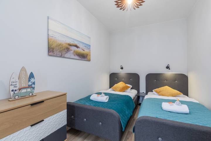 Ganze Wohnung, Comfortable Apartment with Terrace | Close to the Beach, Parking in Darłówko, Darłowo