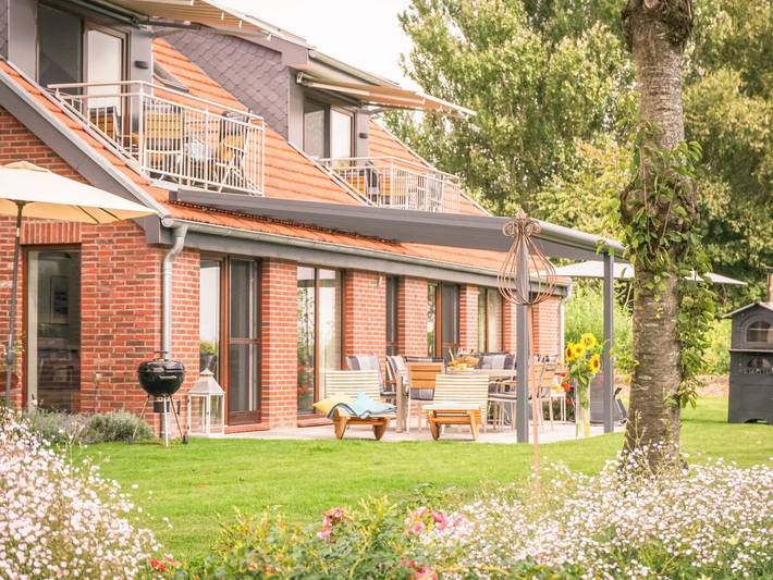 Ferienwohnung für 4 Personen, mit Garten und Ausblick sowie Balkon in Schwanewede