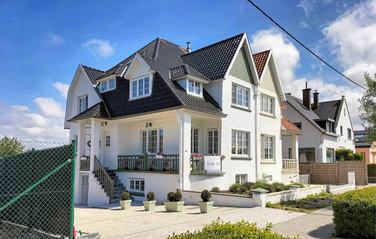 Ferienhaus für 12 Personen, mit Terrasse und Garten in Westende