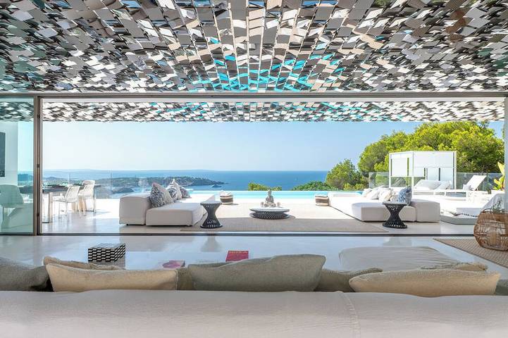 Villa pour 12 personnes, avec jacuzzi ainsi que jardin et sauna à Es Cubells