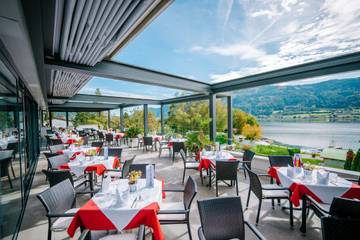 Ferienwohnung für 2 Personen, mit Sauna und Garten sowie Seeblick und Ausblick, kinderfreundlich am Ossiacher See