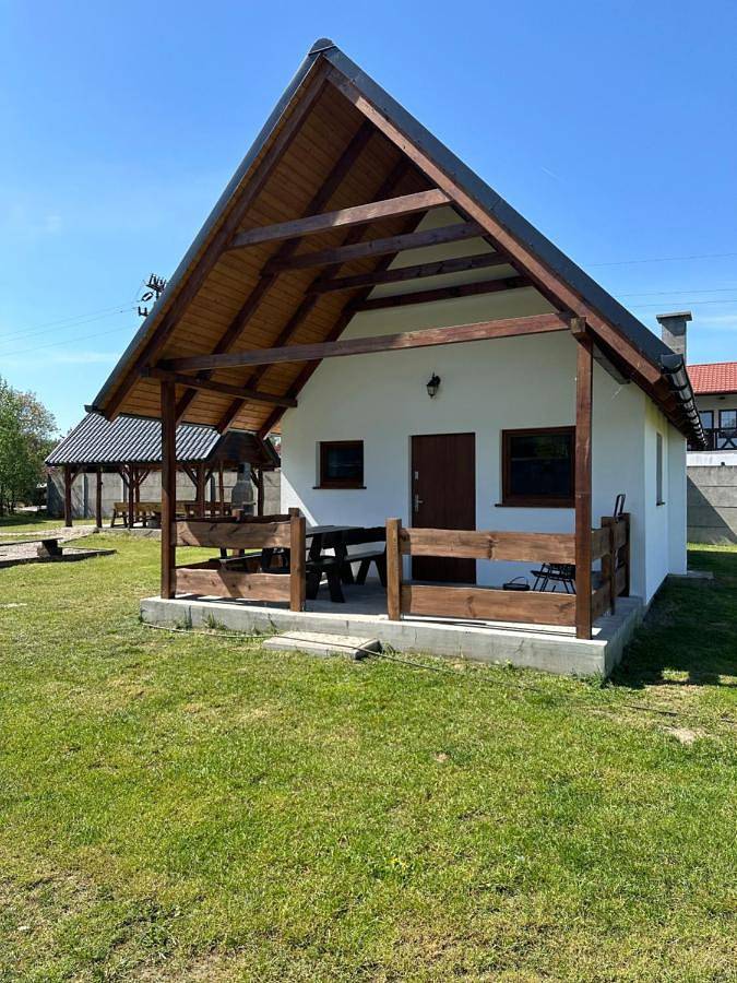 Domek letniskowy 6-osobowy całoroczny nad jeziorem Wilczyńskim, basen, jaccuzi, kajaki rowerki wodne bezpłatnie, duży plac zabaw i wiele udogodnień in Wielkopolska