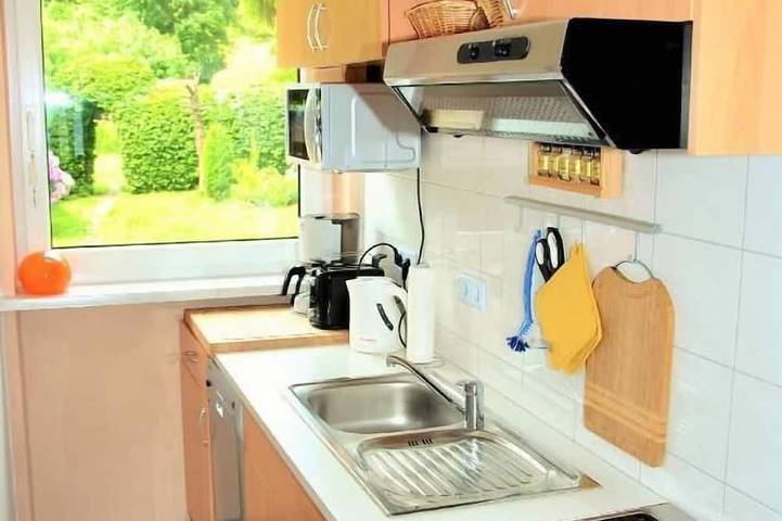 Ferienwohnung für 4 Personen, mit Balkon und Garten sowie Sauna