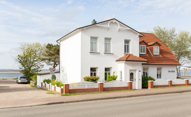 Ferienwohnung für 4 Personen, mit Terrasse und Garten sowie Seeblick in Wittdün