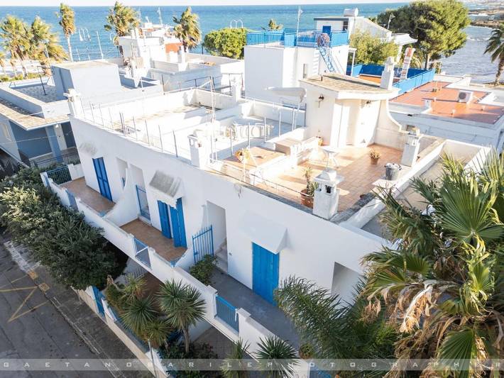 Casa vacanza per 4 persone, con balcone e panorama nonché giardino, adatto a famiglie con bambini in Savelletri