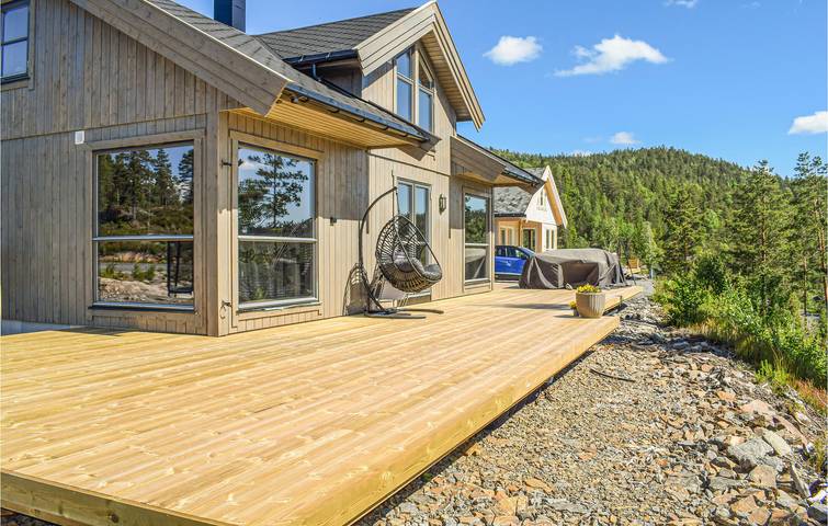 Ferienhaus für 7 Personen, mit Garten und Ausblick sowie Terrasse und Seeblick