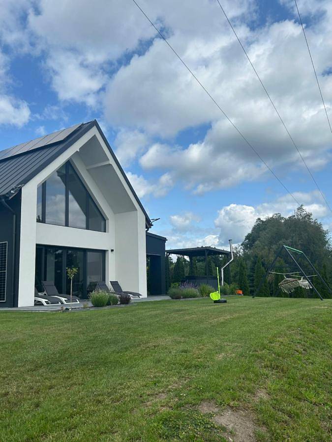 Ferienhaus für 8 Personen, mit Garten und Ausblick sowie Seeblick
