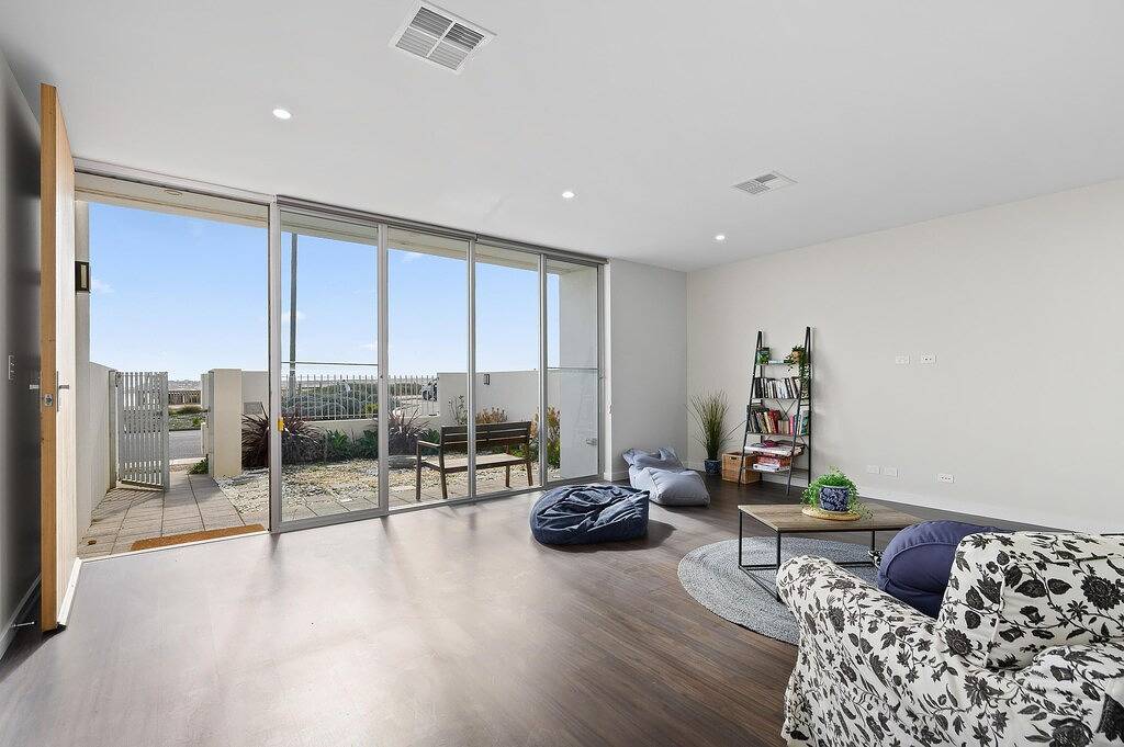 Meander ~ Port Noarlunga South - Perched up high on the red sandstone beach cliffs, your vantage point offers unrivalled views of where the Onkaparinga River meets the sea – just outside your front door. in Aldinga Beach, City of Onkaparinga