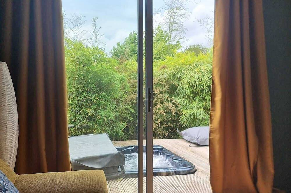 Maison intimiste avec Spa et sauna à 30 minutes de Lyon. Détente et intimité. in Jarnioux, Région de Villefranche-sur-Saône