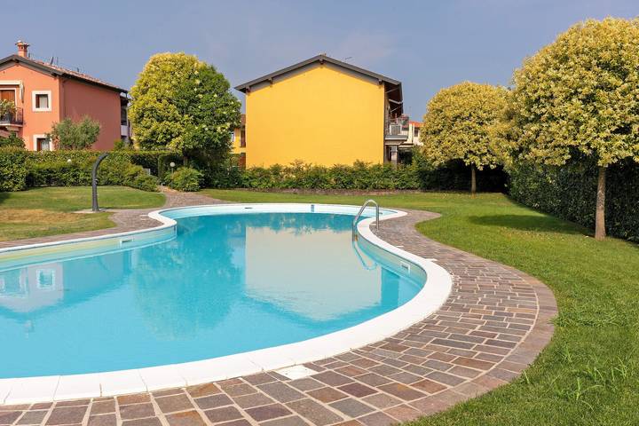 Casa vacanze 'Casa Vacanze Da Ricky' con piscina condivisa, Wi-Fi e aria condizionata in Peschiera del Garda, Prealpi Gardesane