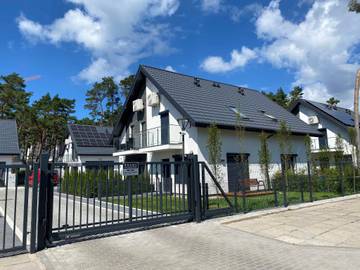 Ferienhaus für 4 Personen, mit Balkon und Garten in Dziwnówek