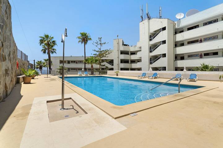 Apartamento entero, Apartamento 'Bonito Arenas Negras' con vistas al mar, balcón, piscina compartida y Wi-Fi in Playa Neptuno (Santiago del Teide), Santiago del Teide