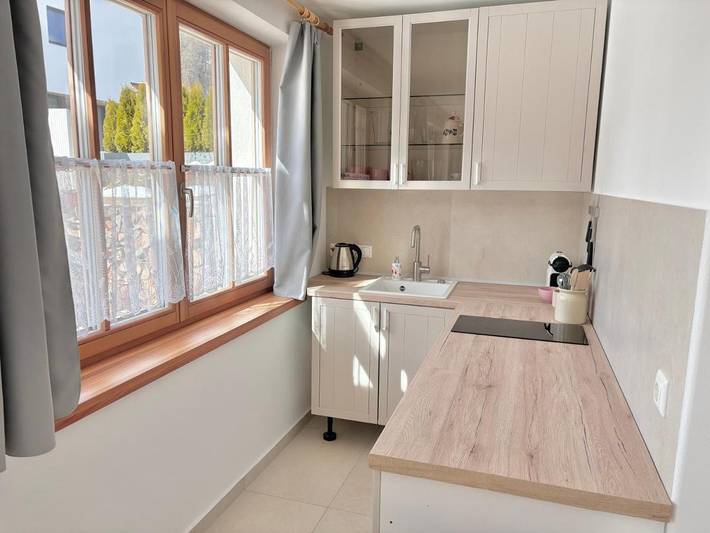 Ferienwohnung für 3 Personen, mit Terrasse und Garten sowie Ausblick