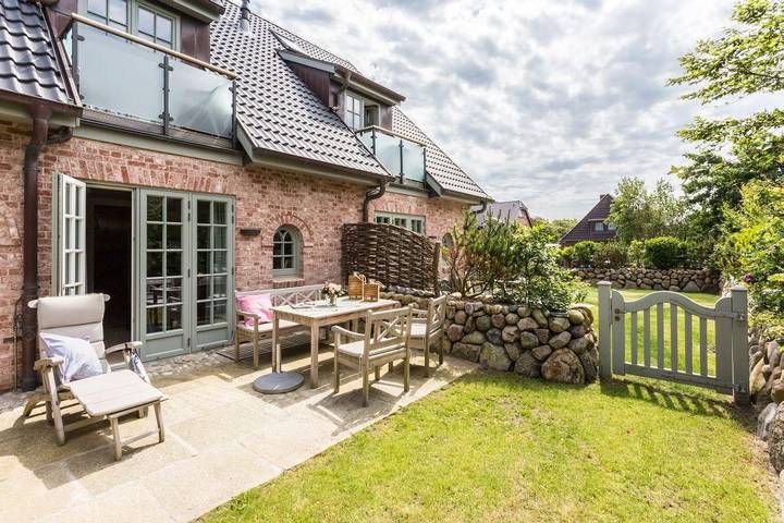 Ferienwohnung für 6 Personen, mit Terrasse und Garten sowie Sauna in Westerland
