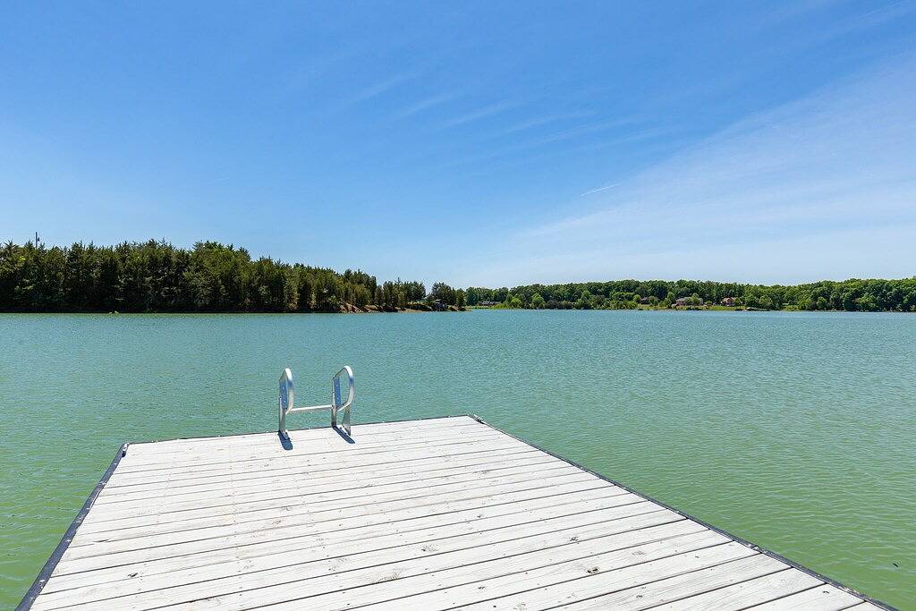 Pet-Friendly Luxury Home With Incredible Outdoor Living, Private Dock + Hot Tub in Douglas Lake