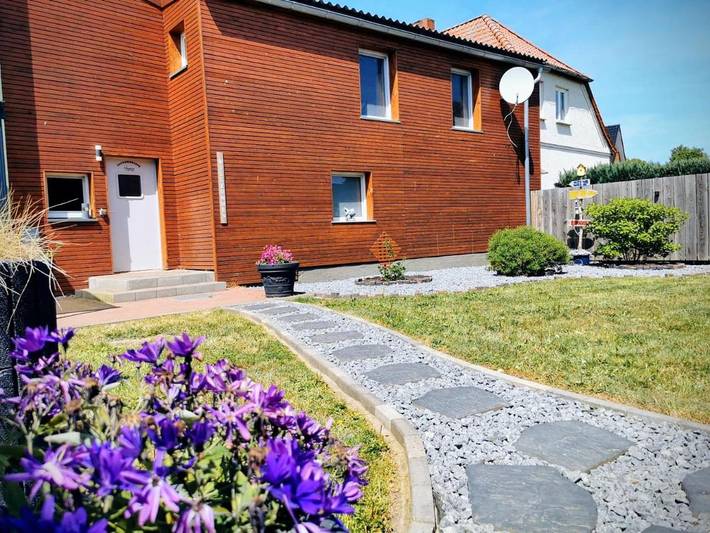 Ferienwohnung für 4 Personen, mit Terrasse und Garten sowie Sauna und Ausblick