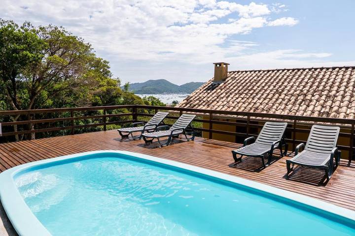 Casas e apartamentos de temporada para 2 pessoas, com piscina e jardim e ainda vista em Porto Belo