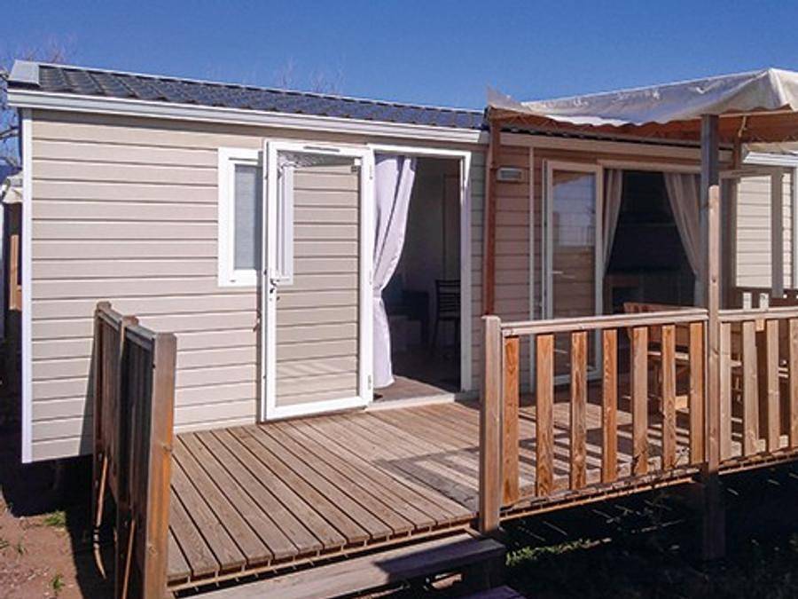 Camping Le Petit Mousse - Mobilhome 4 personnes - Mobil-home | Comfort Xl | 2 Ch. | 4 Pers. | Terrasse surélevée | Clim. in Vias Plage, Vias