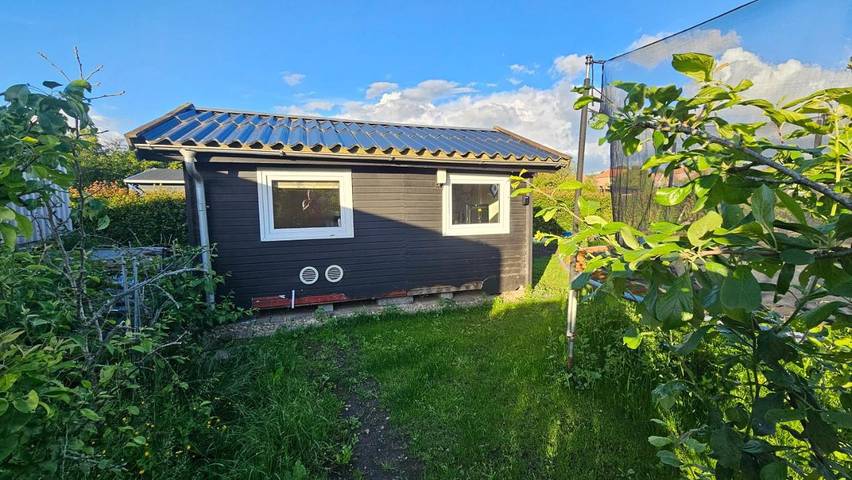 Ferienhaus für 4 Personen, mit Terrasse und Garten