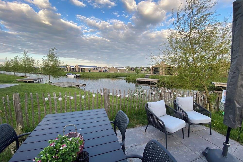 Elegantes Ferienhaus mit Steg am See Kampen Niederlande Boot Chalet Angelurlaub in Kampen, Veluwemeer