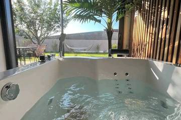 Cottage pour 4 personnes, avec terrasse ainsi que jacuzzi et jardin à Loon-Plage
