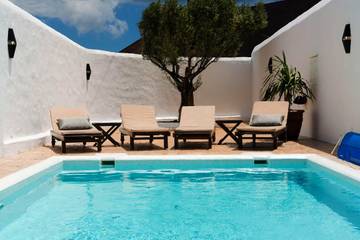 Location de vacances pour 5 personnes, avec jardin et piscine ainsi que sauna et vue dans Guatiza