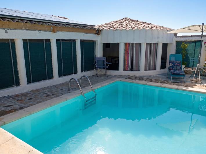 Appartement de vacances pour 4 personnes, avec Terrasse ainsi que Jardin et Piscine