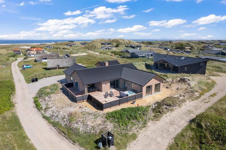 Ferienhaus für 8 Personen, mit Whirlpool und Terrasse sowie Pool und Sauna in Årgab