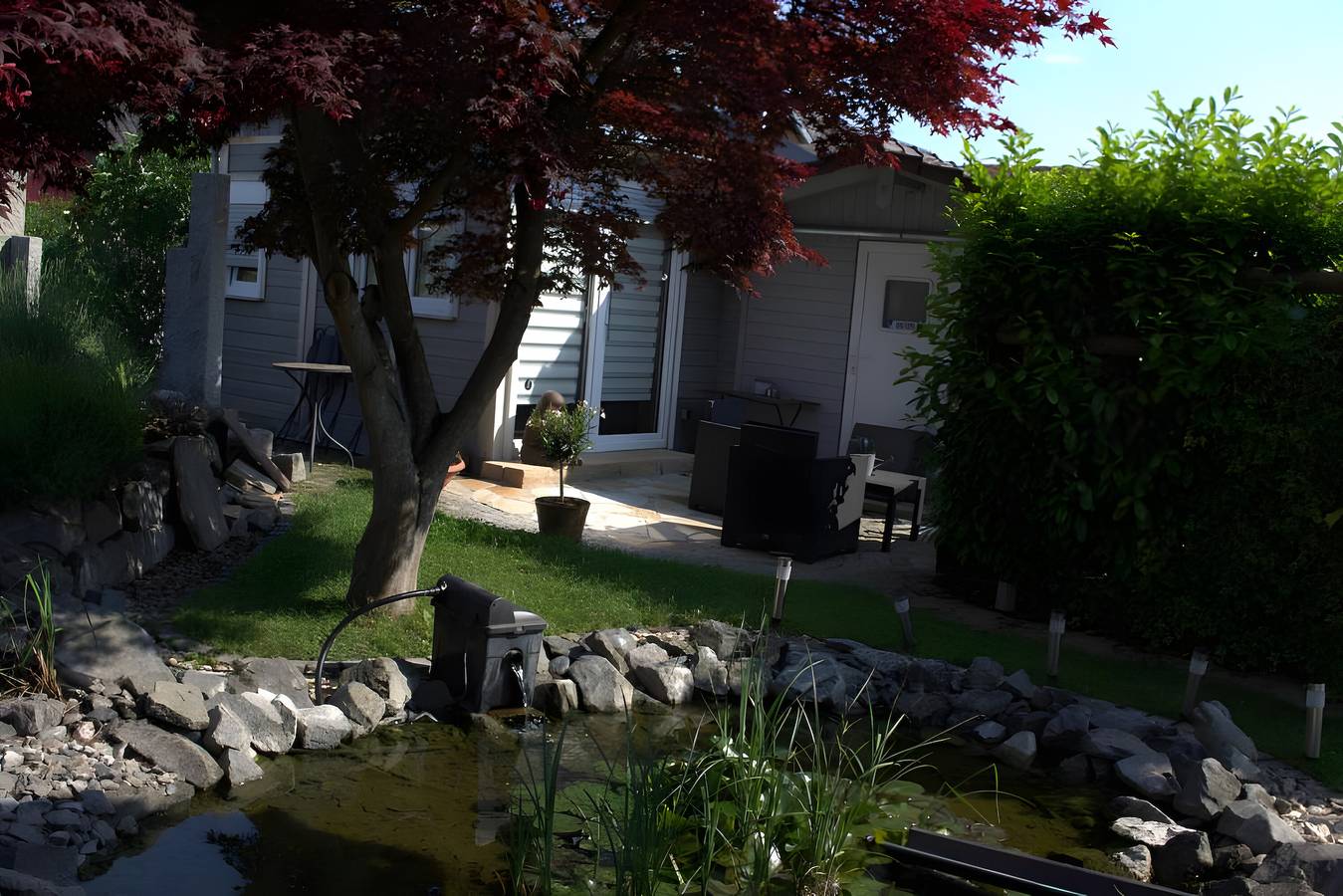 Ganze Ferienwohnung, Tiny Home 'Am See' mit gemeinsamer Terrasse, gemeinsamem Garten und Wlan in Europa-Park, Rust