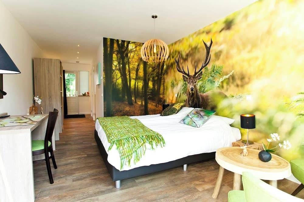 Studio met woon-slaapkamer en 2 eenpersoonsbedden in Hoge Veluwe