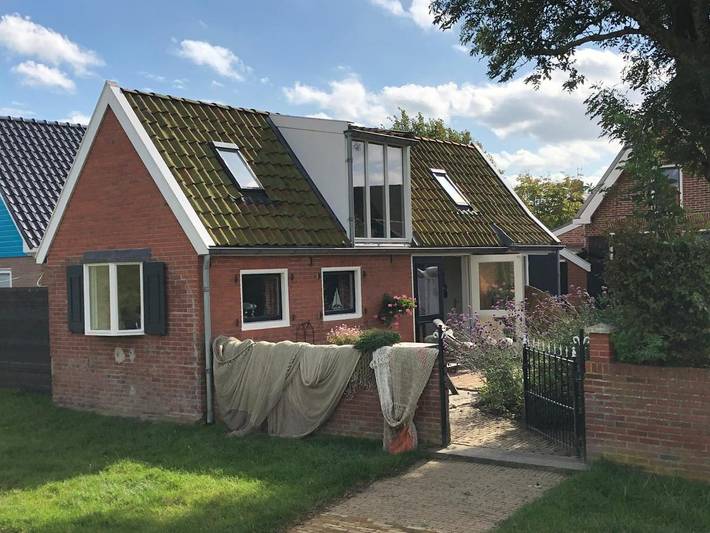 Ferienwohnung für 4 Personen, mit Terrasse und Garten sowie Ausblick in Moddergat