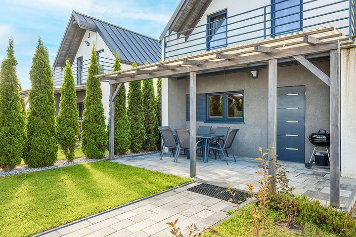 Ferienhaus für 8 Personen, mit Balkon und Terrasse in Sarbinowo