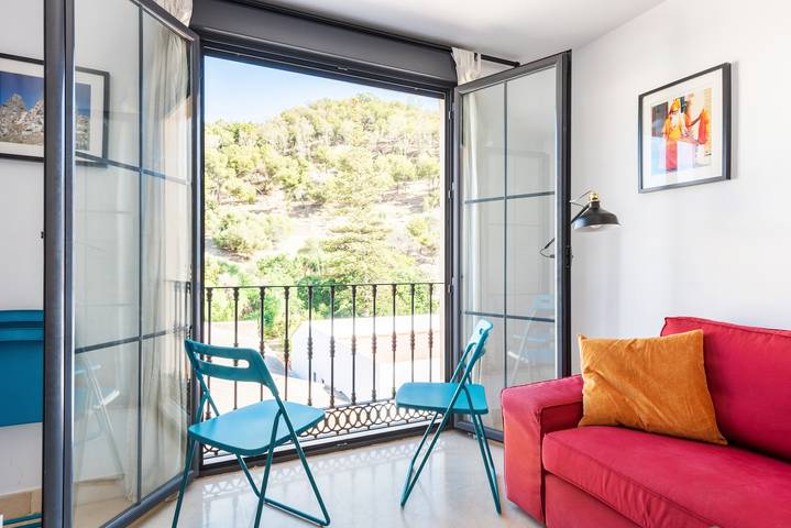Apartamento entero, Apartamento 'El Ático De La Montaña' con balcón, Wi-Fi y aire acondicionado in Málaga Centro, Málaga