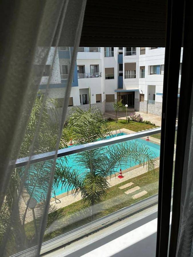 Appartement de vacances pour 4 personnes, avec vue et jardin ainsi que balcon et piscine