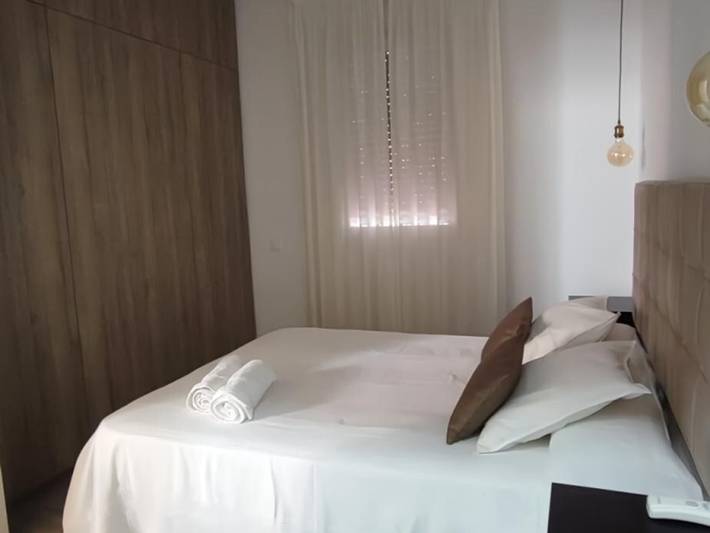 Entire apartment, Charming Andalusian house near beach with private patio in Málaga (Este), Malaga