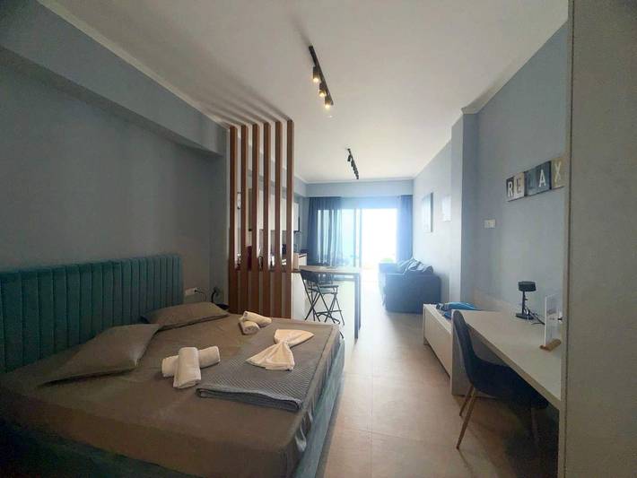 Entire holiday apartment, Charaki Escape Chic Studio with Seafront Patio in Charaki, Rhodes