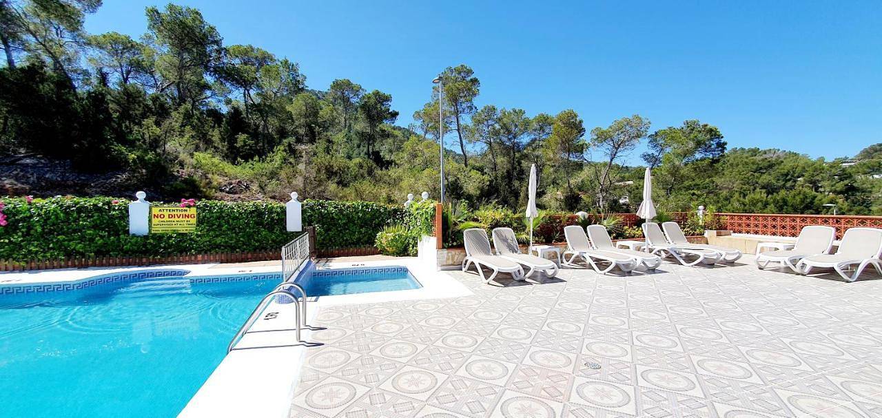 Apartamento inteiro, Granada Apartments Familiar Deluxe in s'Arenal Gran, Sant Joan de Labritja