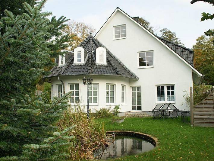 Ferienwohnung für 4 Personen, mit Terrasse und Garten sowie Sauna