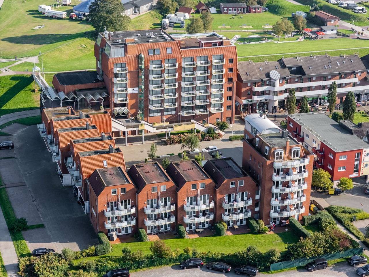 Ganze Ferienwohnung, Hus Inselkieker - Familienfreundliche Ferienwohnung an der Nordsee mit Balkon und Blick zum Deich in Schillig Strand, Wangerland