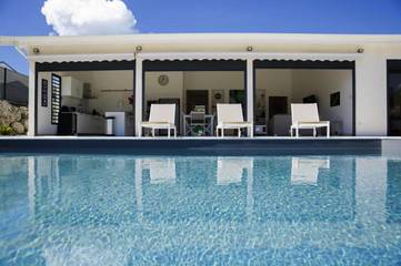 Cottage pour 10 personnes, avec piscine ainsi que jacuzzi et jardin dans Anse Tarare