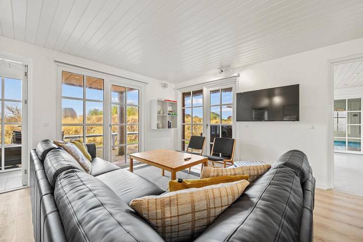 Impressive holiday home close to the beach with pool and games room in Blåvand in Blavand, Región de Varde