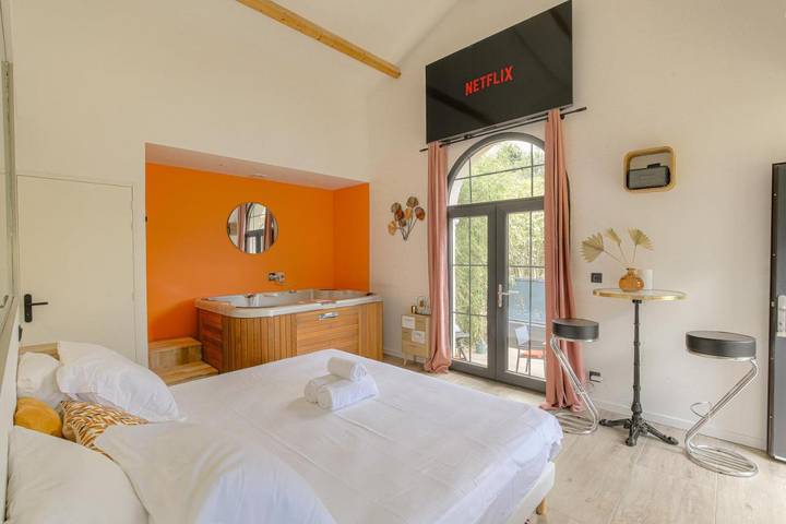 Appartement de vacances pour 2 personnes, avec terrasse ainsi que jardin et jacuzzi