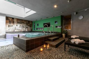 Hôtel pour 4 personnes, avec jardin et bassin pour enfant ainsi que vue et sauna, animaux acceptés à Transacqua