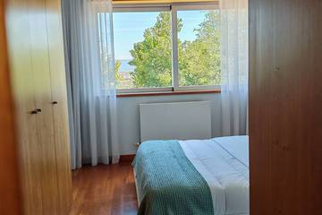 Location de vacances pour 10 personnes, avec balcon et jardin dans Viana do Castelo