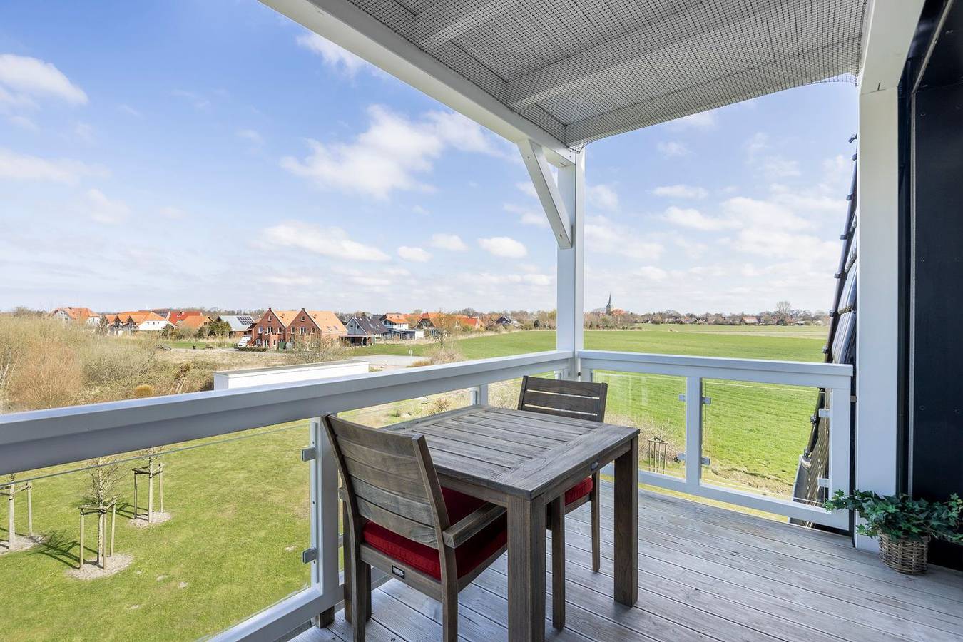 Ganze Wohnung, Strandnahe Ferienwohnung mit Sauna und schönem, überdachten Balkon mit Ausblick in Samtgemeinde Land Wursten, Wurster Nordseeküste